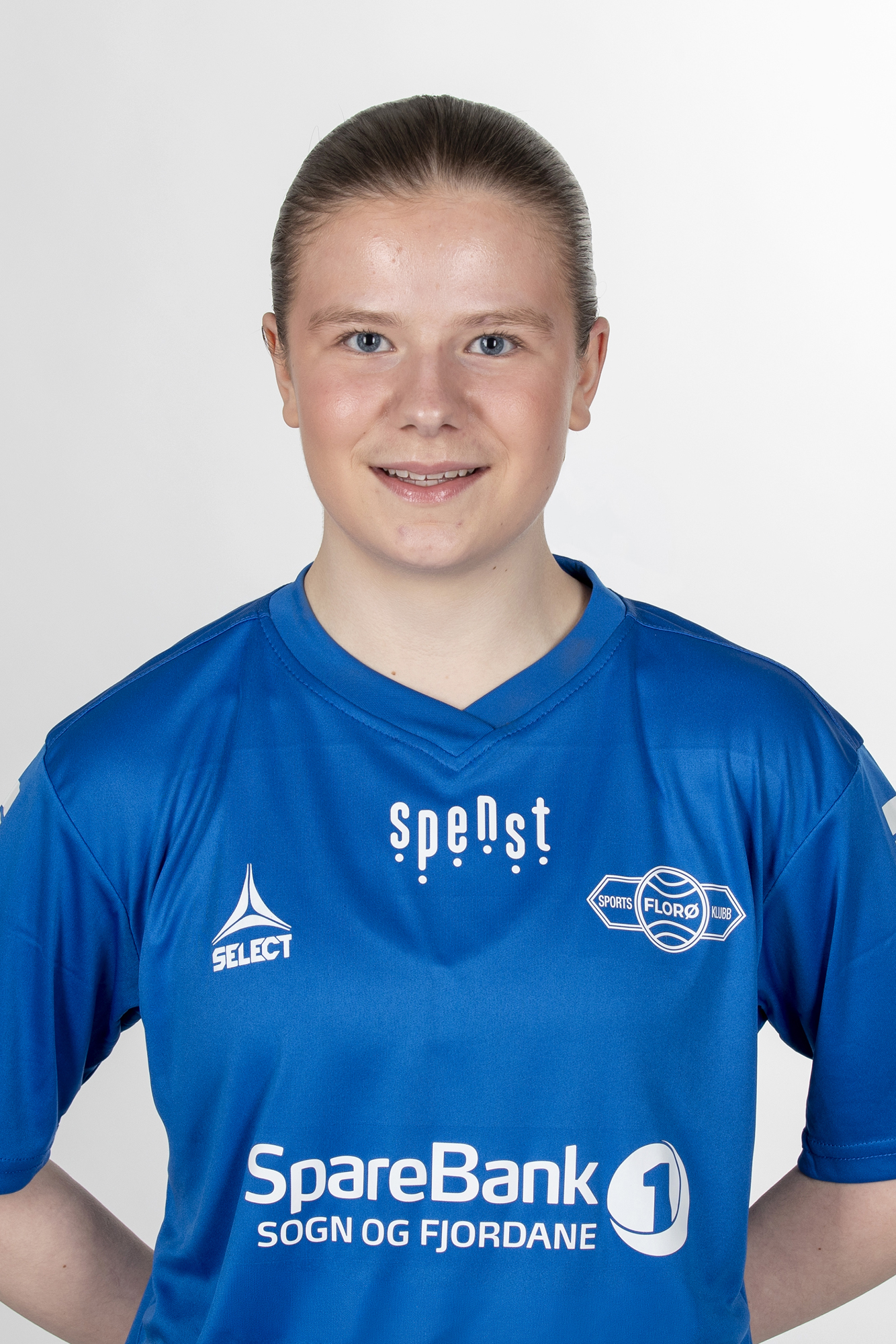 Image of a woman taking a photo.