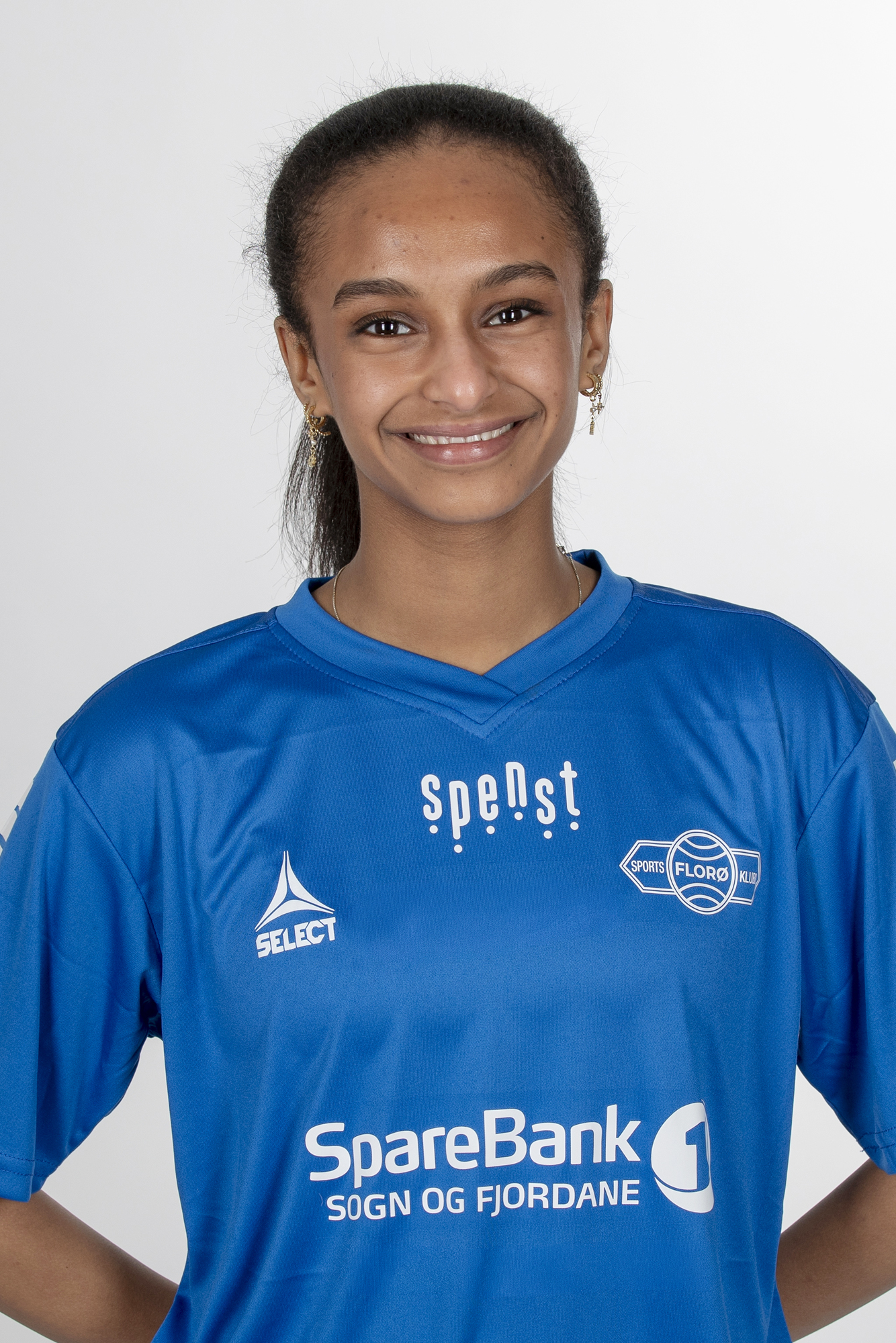 Image of a woman taking a photo.