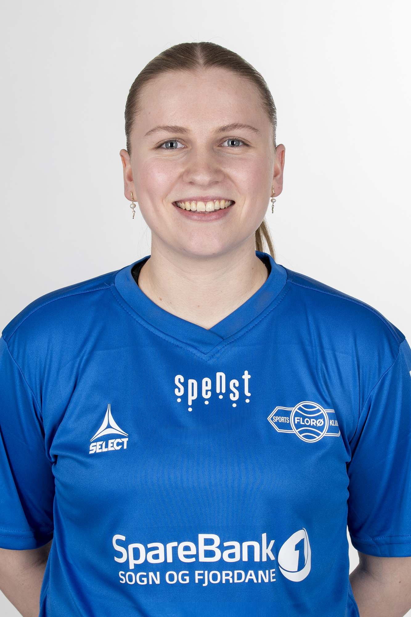 Image of a woman taking a photo.