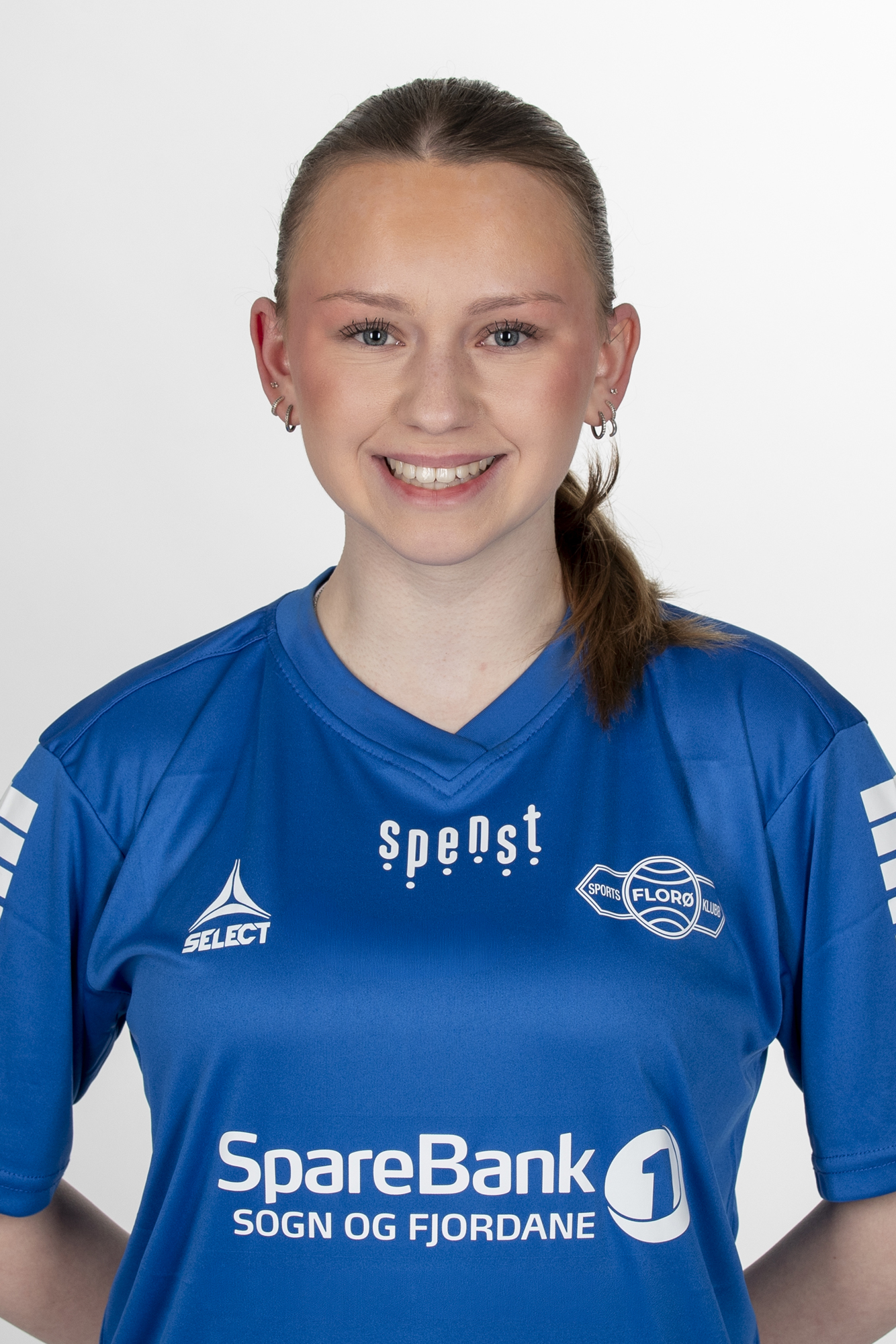 Image of a woman taking a photo.