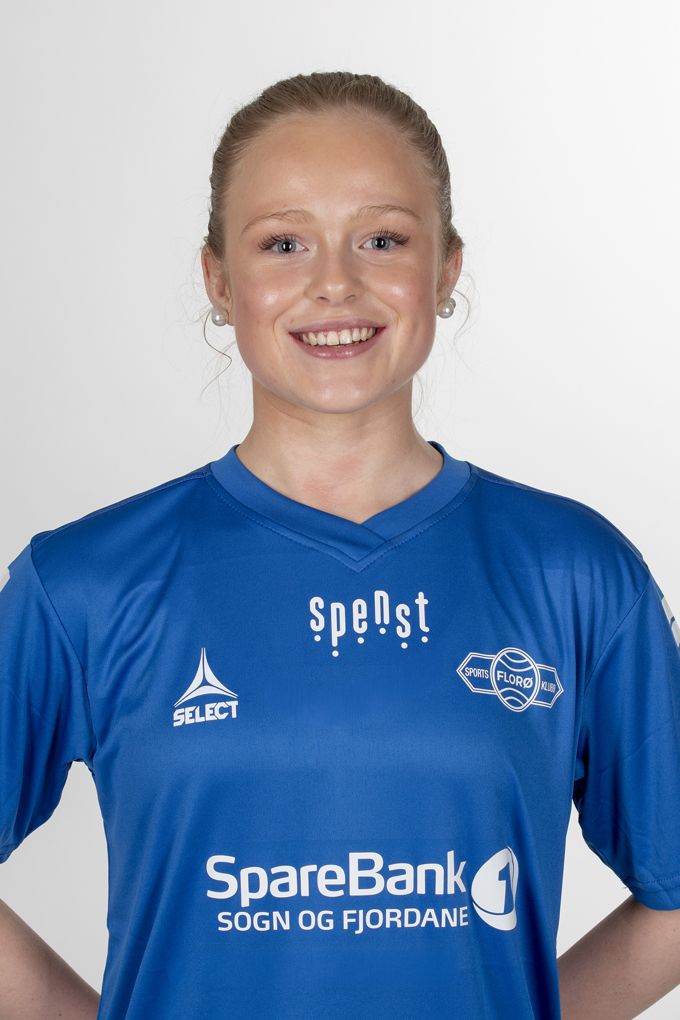 Image of a woman taking a photo.