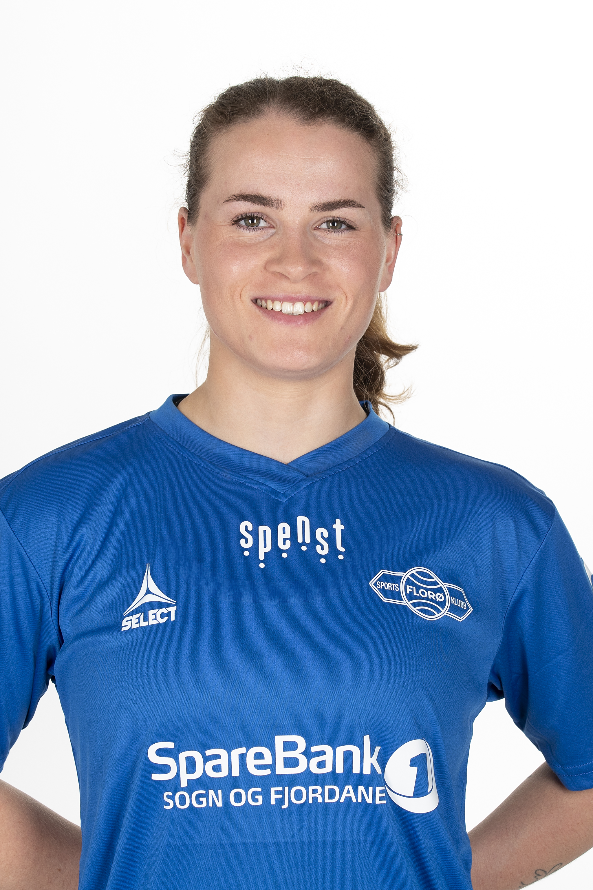 Image of a woman taking a photo.