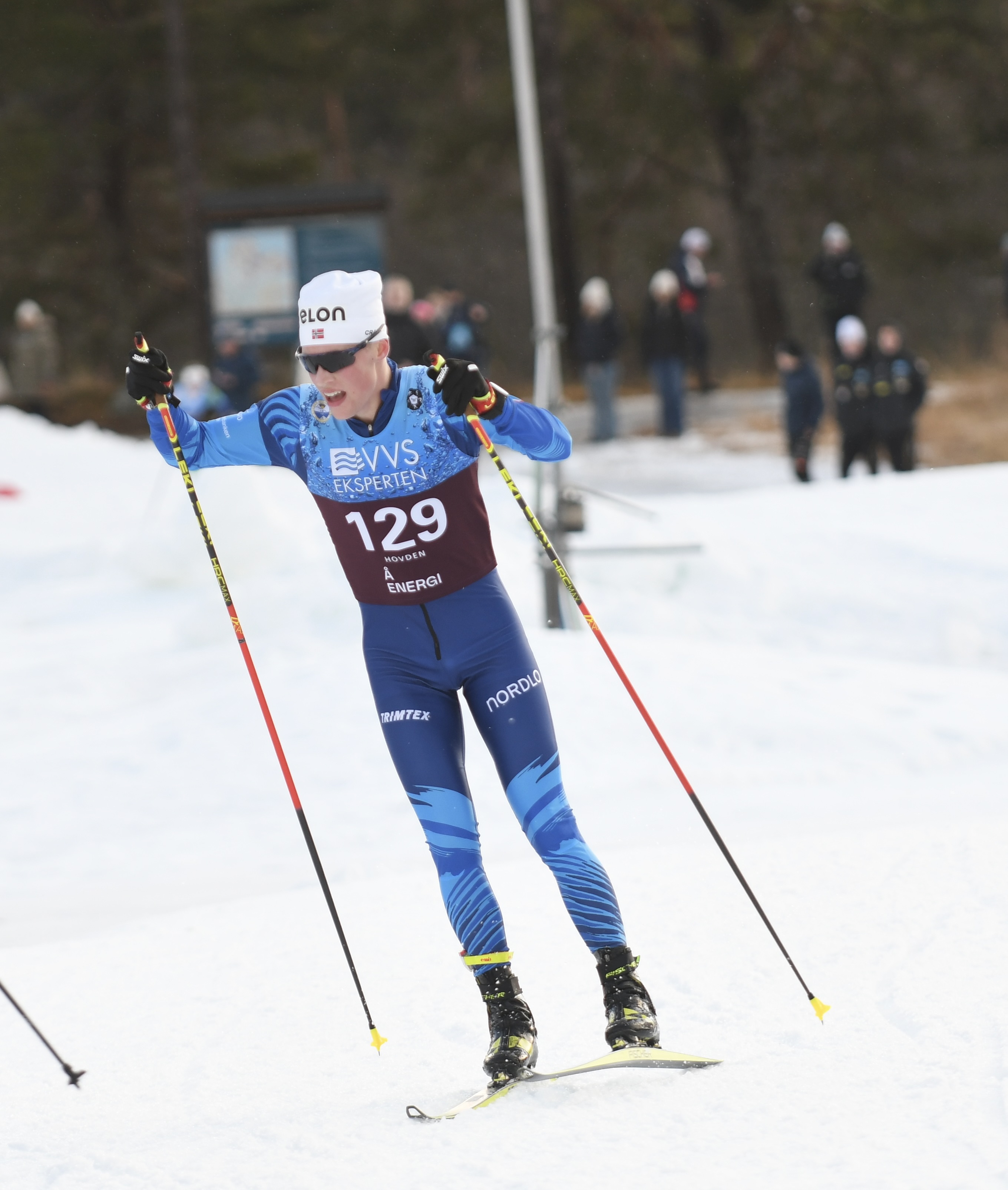 Image of a woman taking a photo.