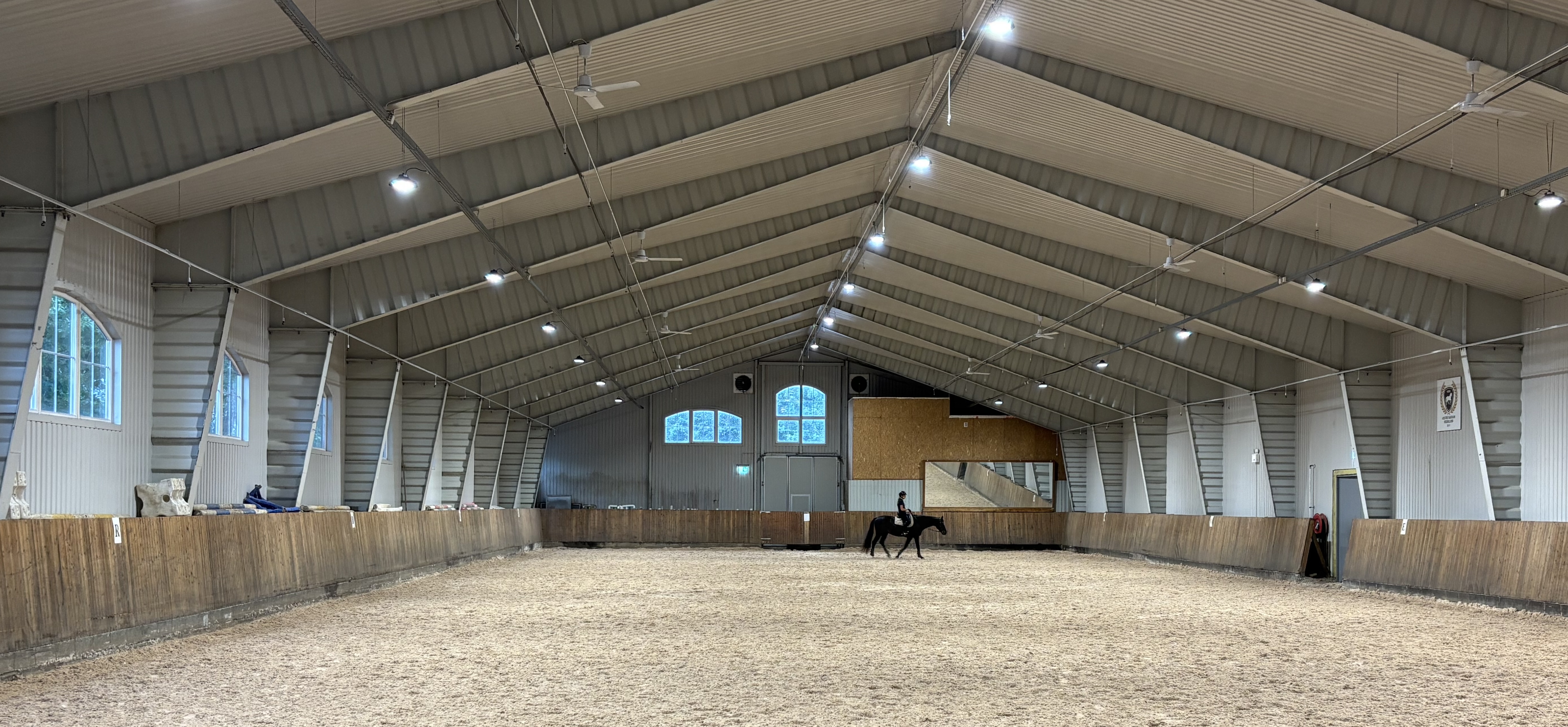 Image of a woman taking a photo.