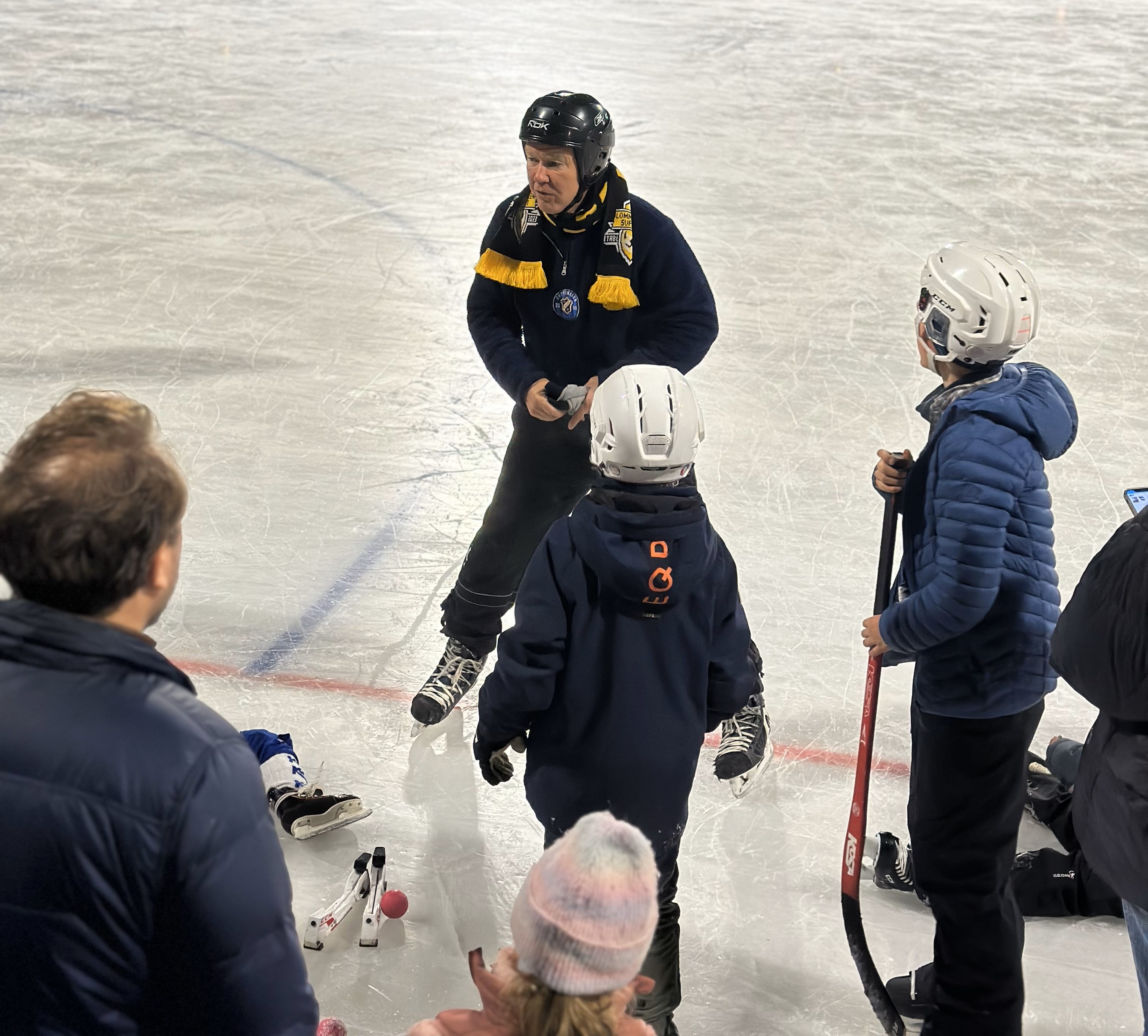 Image of a woman taking a photo.