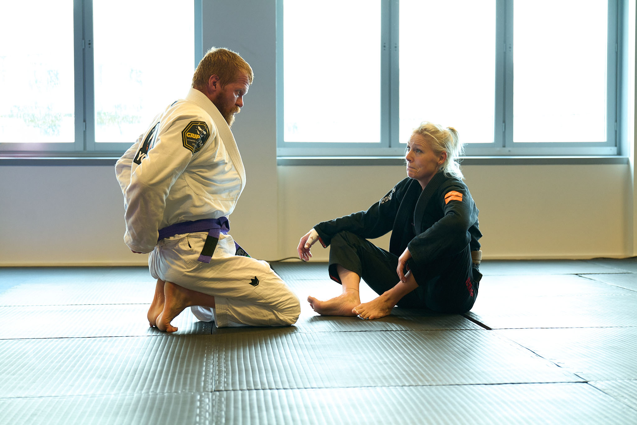Students grappling on the mat