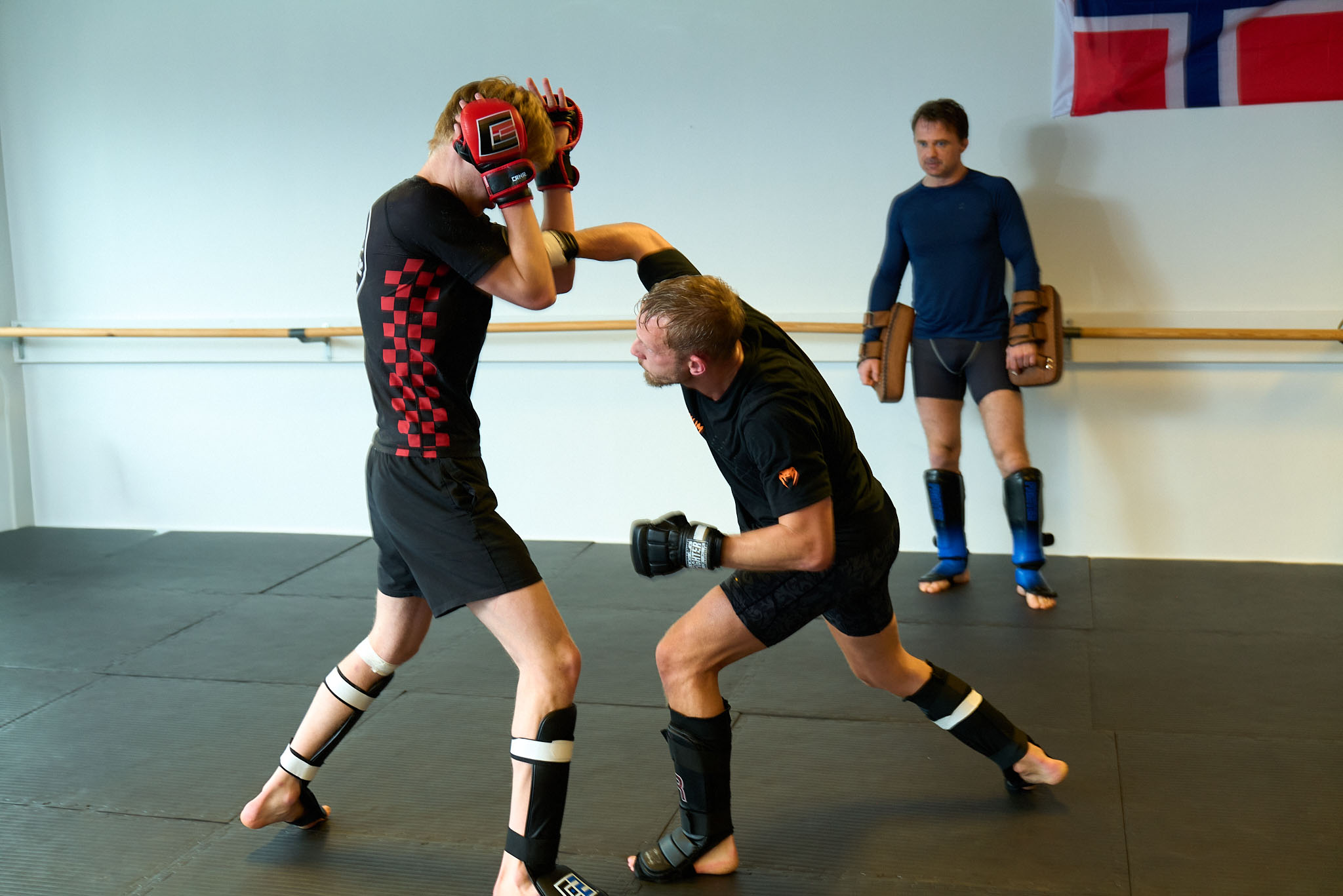 Image of a woman taking a photo.