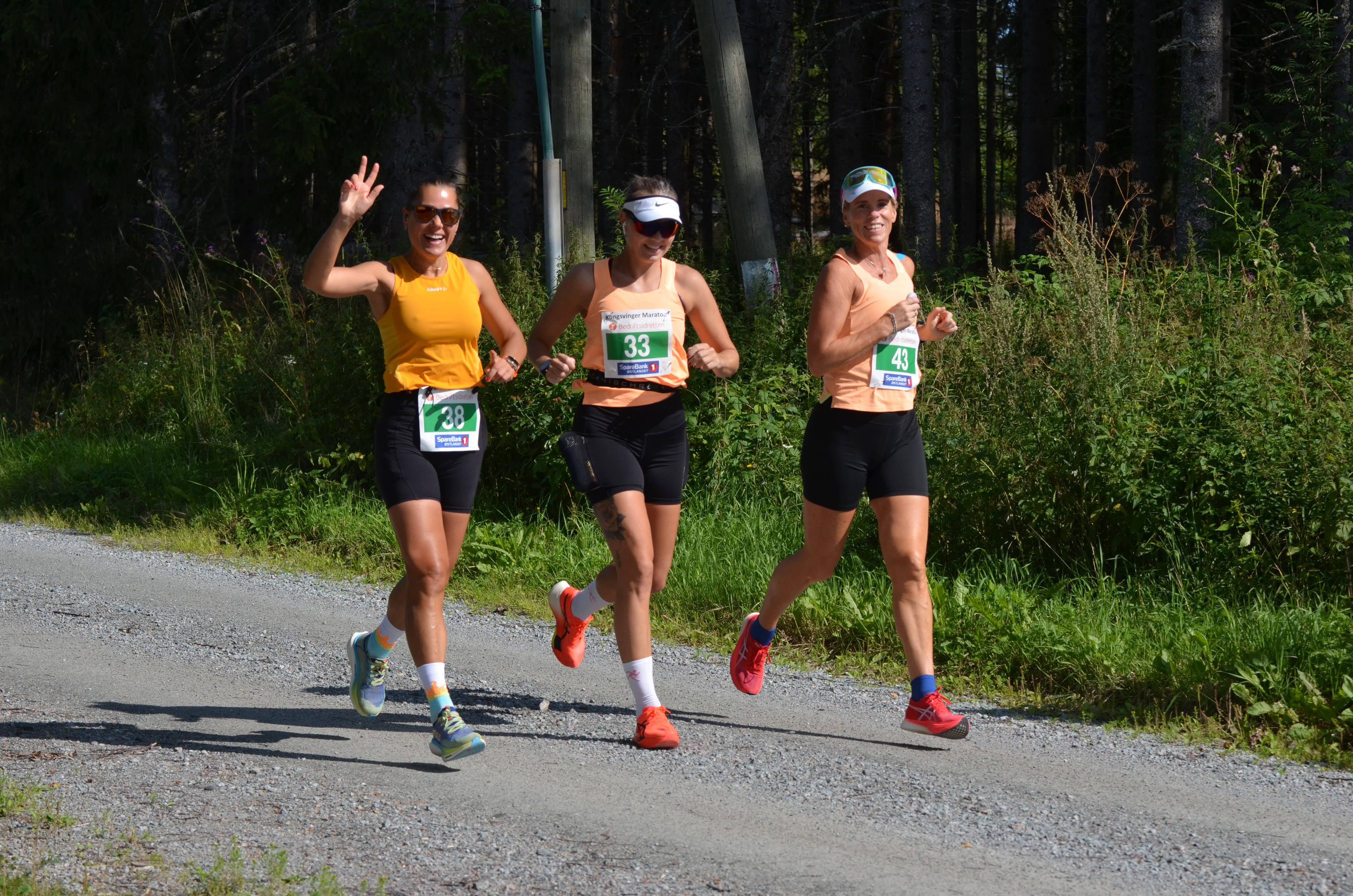 Image of a woman taking a photo.