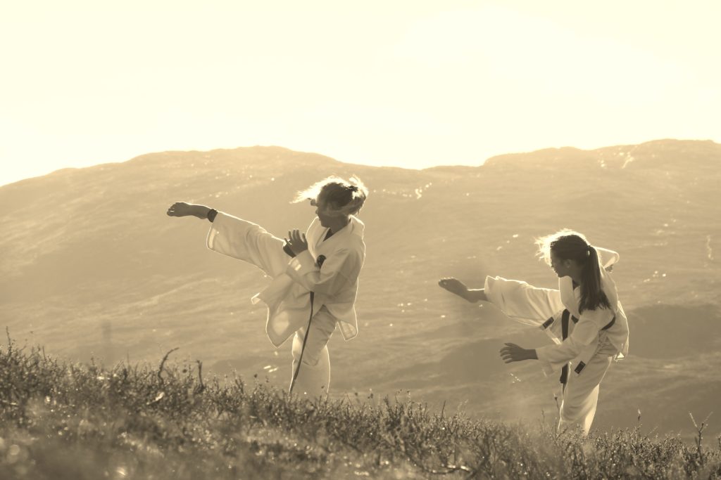 Image of a woman taking a photo.