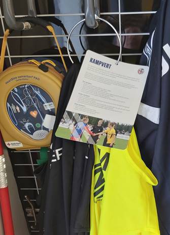 Image of a woman taking a photo.