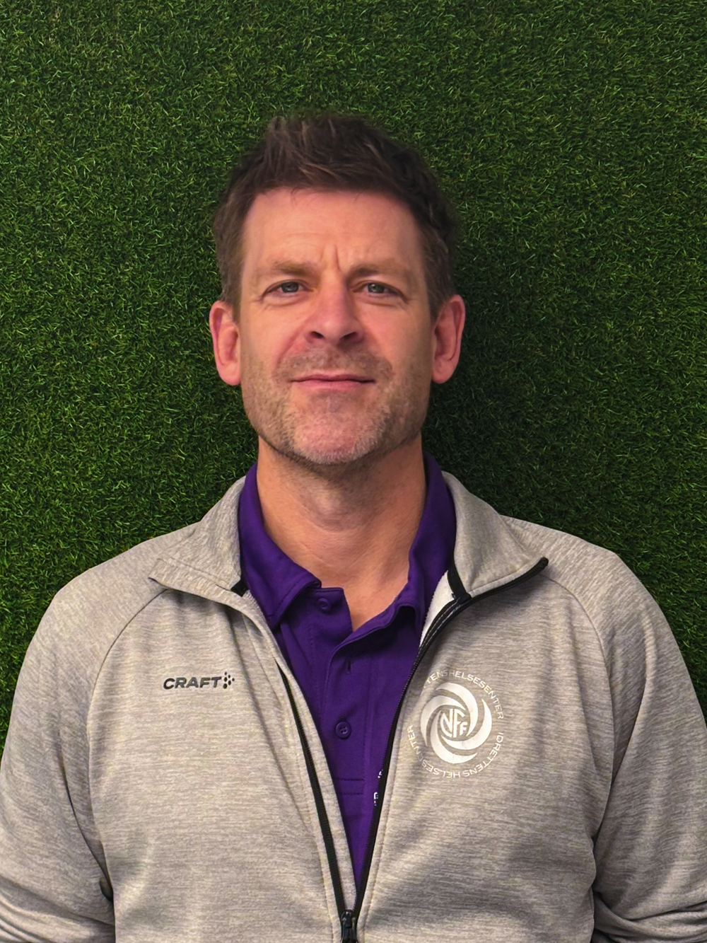 Image of a woman taking a photo.