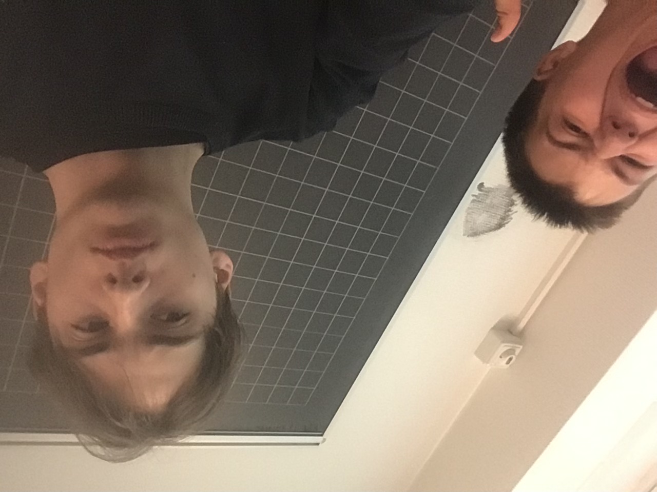 Image of a woman taking a photo.